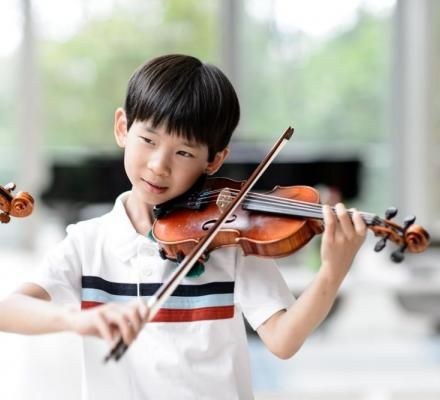 Boy playing violin