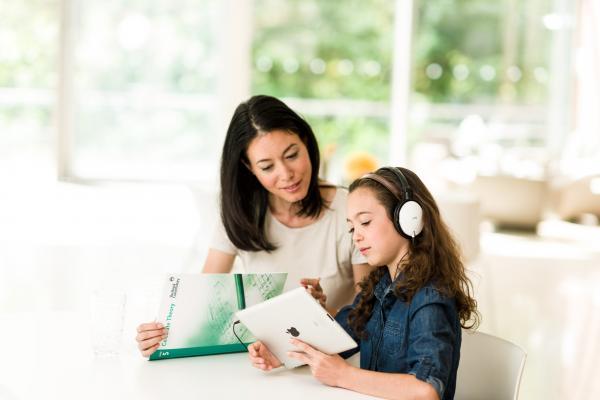 Student and teacher listening to music